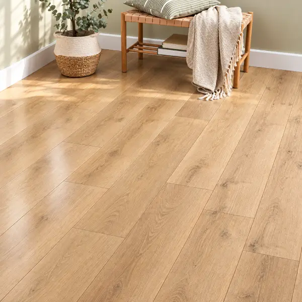 Herringbone-pattern vinyl plank flooring completed in a Dubai townhouse living area
